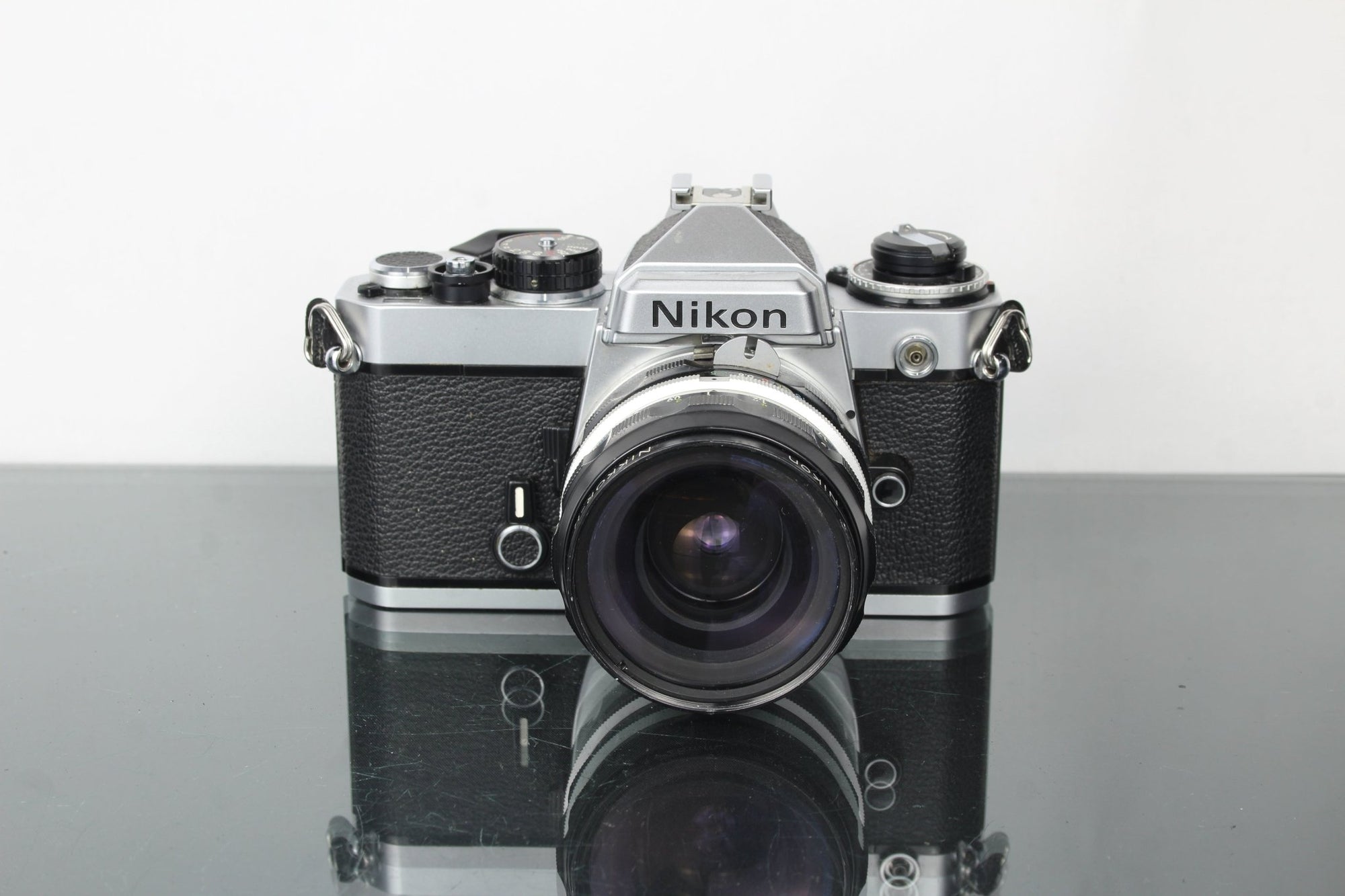 Nikon FE + Nikkor - H 28mm f/3.5 lens - Dutch|Thrift