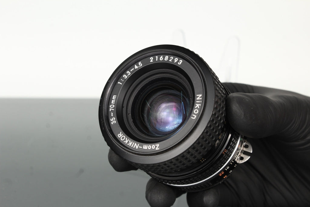 Nikon Zoom - Nikkor 35 - 70mm 1:3.3 - 4.5 - Dutch|Thrift