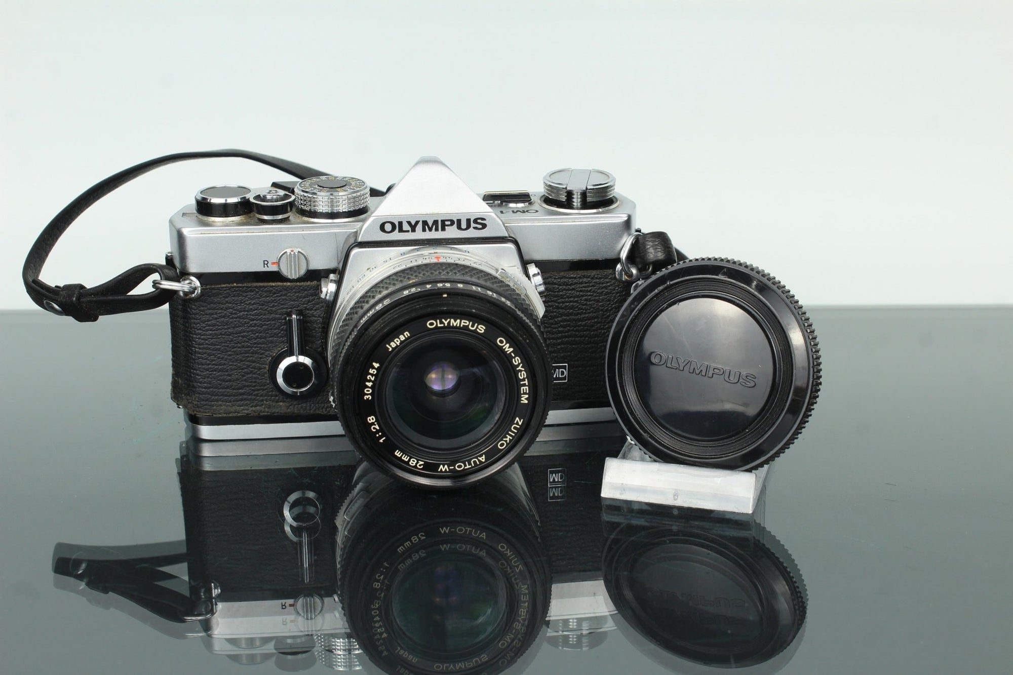 Olympus OM - 1 + Auto W 28mm 1:2.8 - Dutch|Thrift