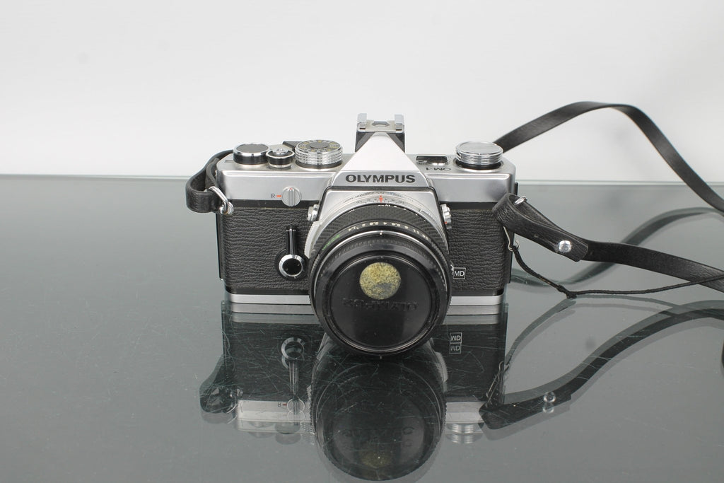 Olympus OM - 1 + Olympus Auto - S 50mm f/1.4 - Dutch|Thrift
