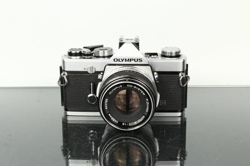 Olympus OM - 1 + Olympus Auto - S 50mm f/1.8 - Dutch|Thrift