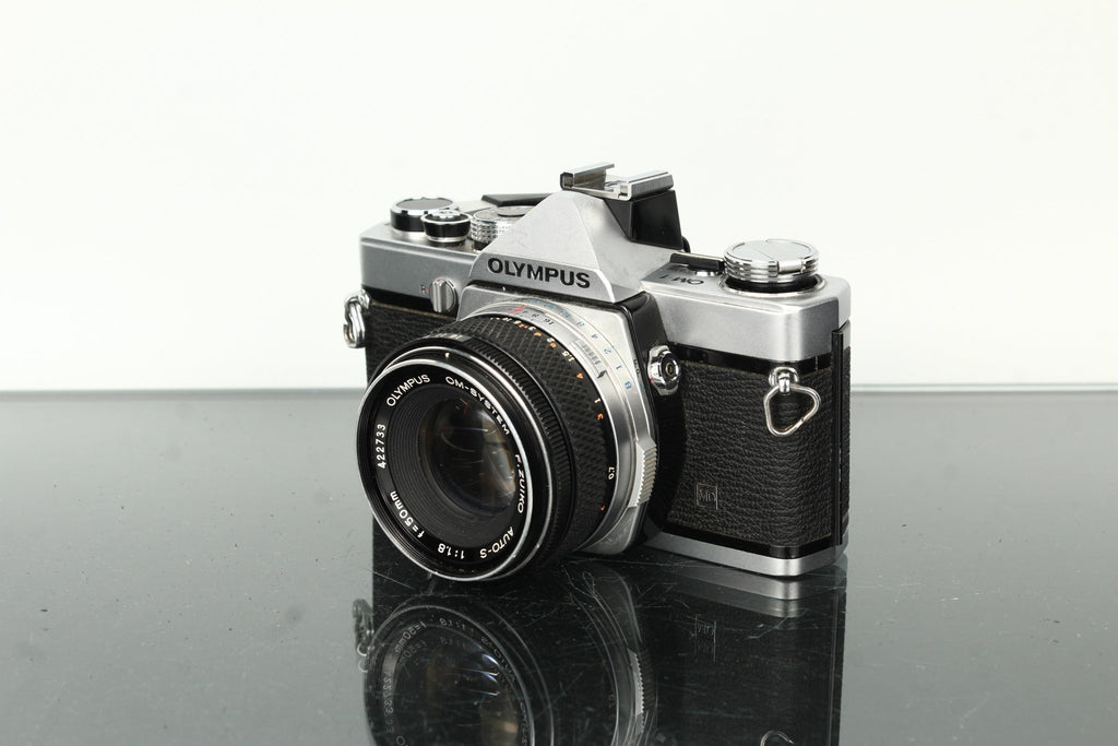 Olympus OM - 1 + Olympus Auto - S 50mm f/1.8 - Dutch|Thrift