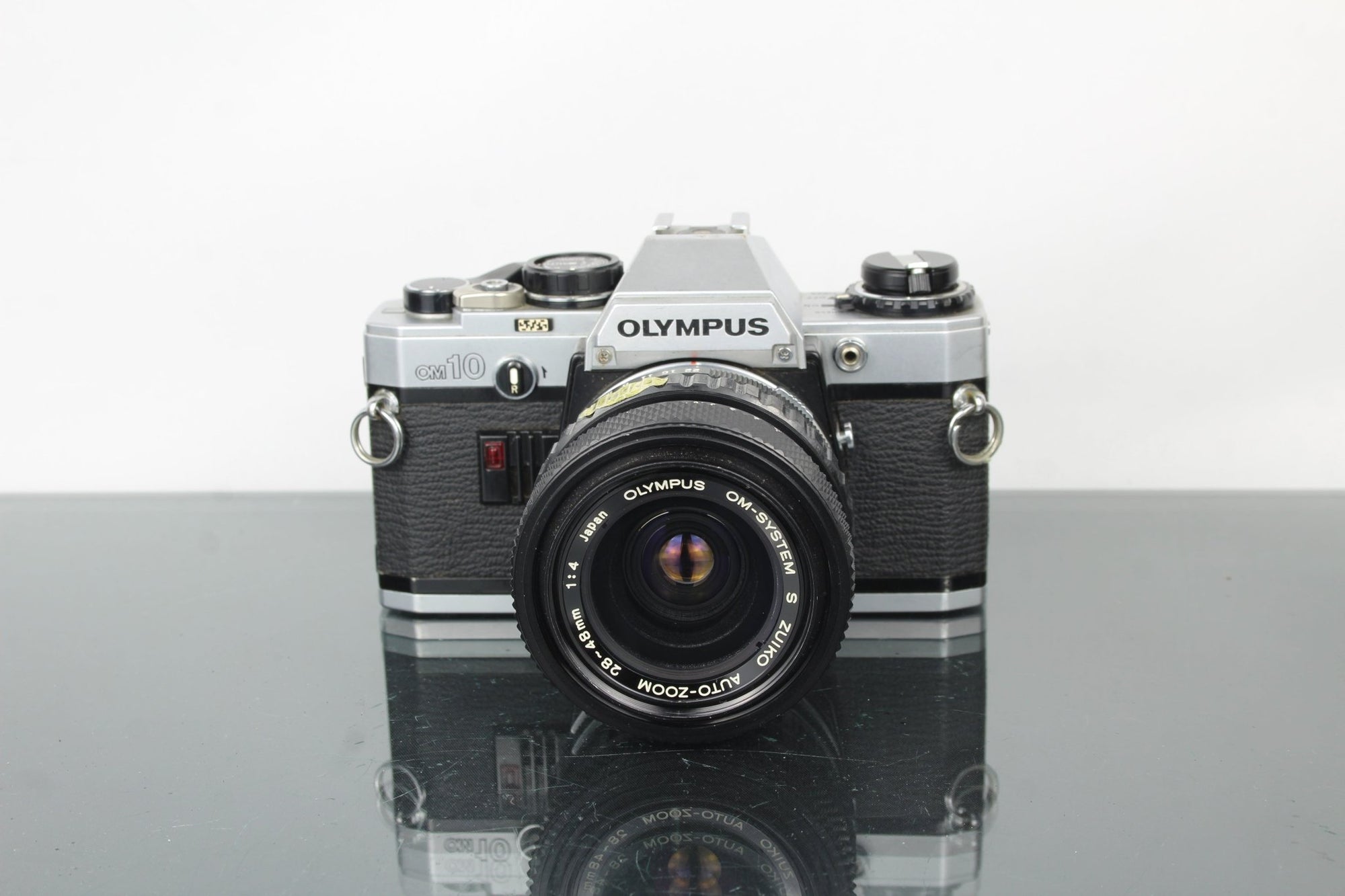 Olympus OM 10 + 28 - 48mm 1:4 Olympus lens - Dutch|Thrift