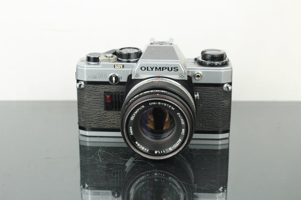 Olympus OM 10 + 50mm 1.8 Olympus lens - Dutch|Thrift