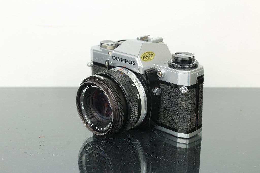 Olympus OM 10 + 50mm 1.8 Olympus lens - Dutch|Thrift