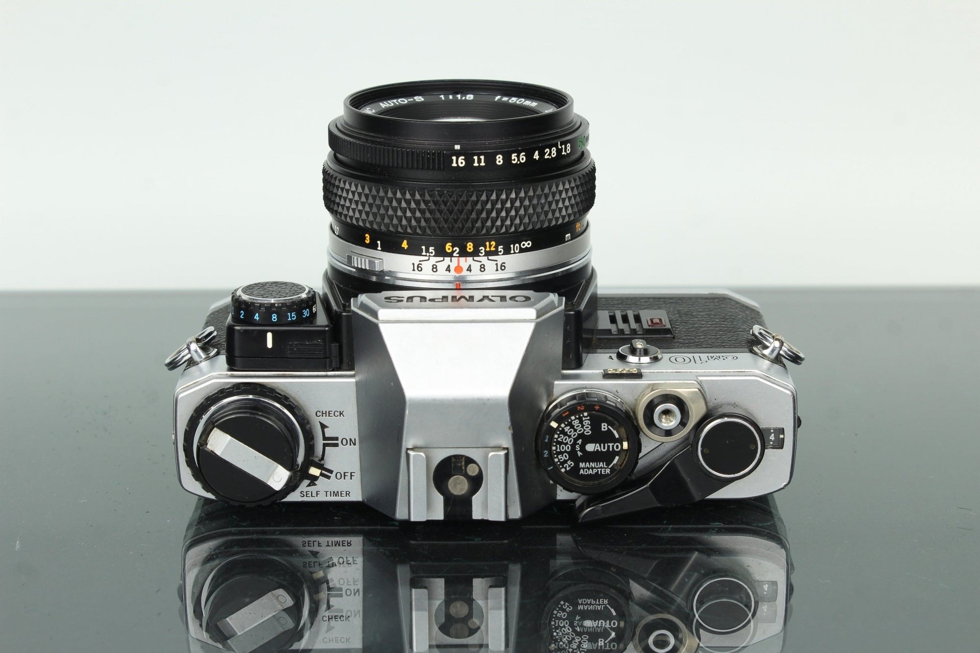 Olympus OM - 10 + Olympus Auto - S 50mm f/1.8 - Dutch|Thrift