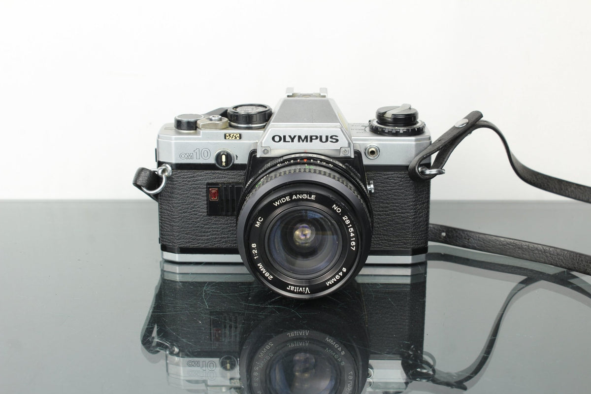 Olympus OM 10 + Vivitar 28mm 1:2.8 MC lens (OM mount) - Dutch|Thrift