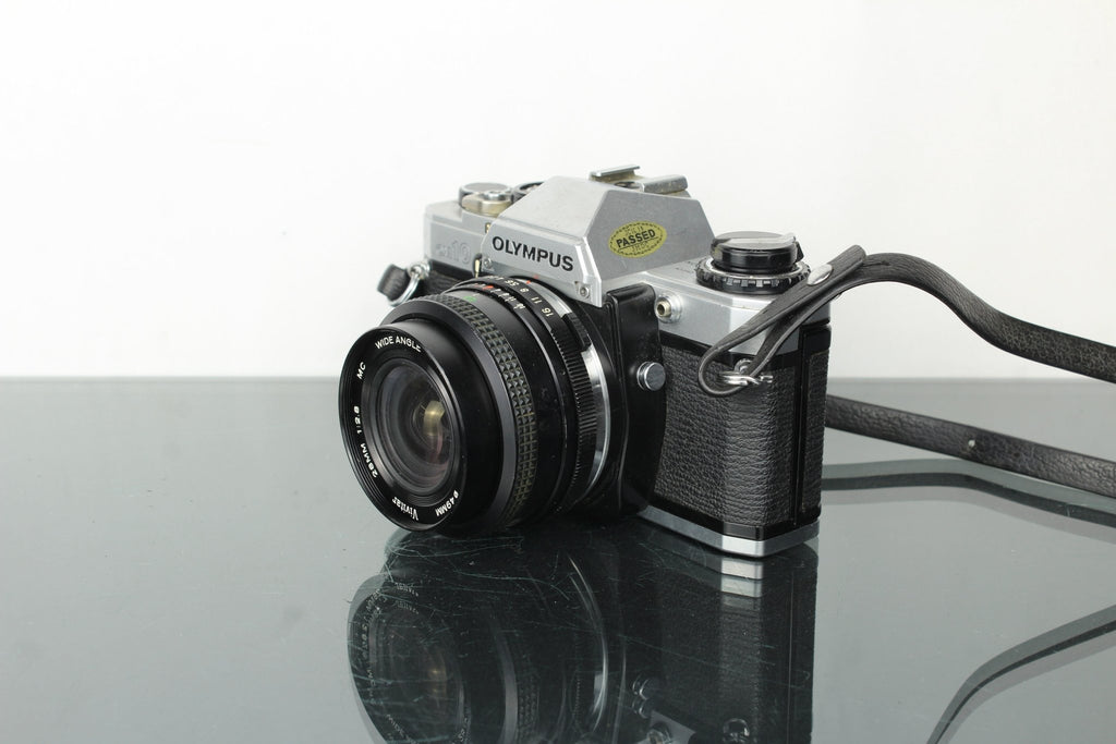 Olympus OM 10 + Vivitar 28mm 1:2.8 MC lens (OM mount) - Dutch|Thrift