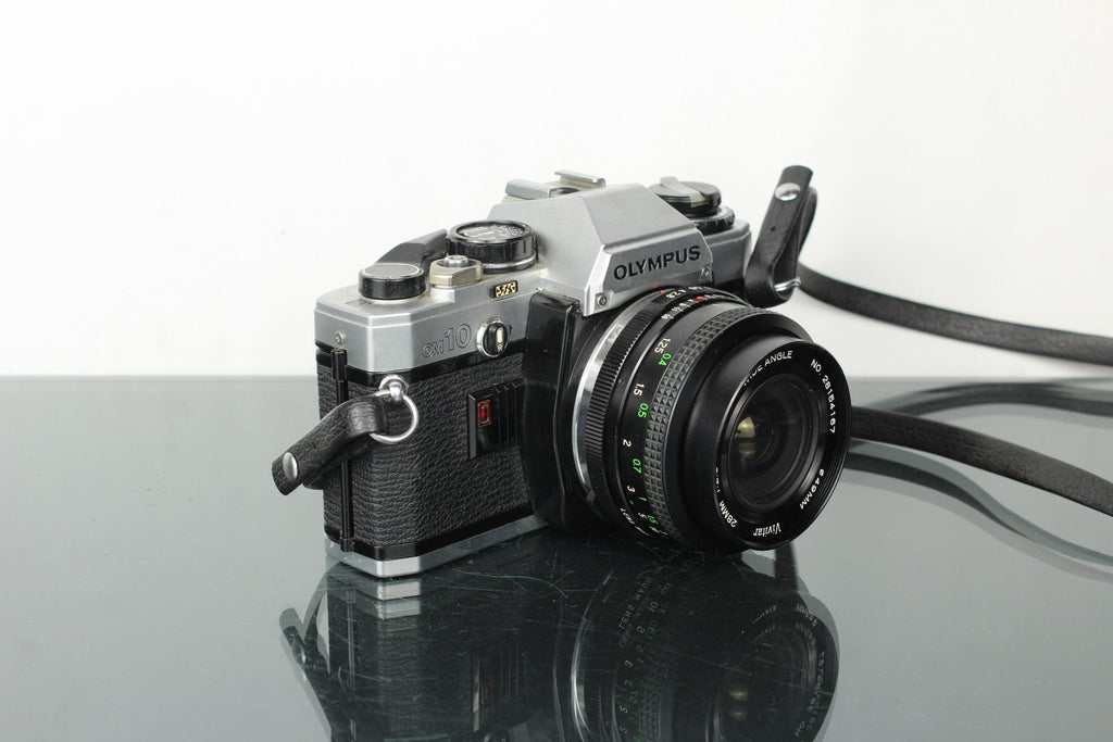 Olympus OM 10 + Vivitar 28mm 1:2.8 MC lens (OM mount) - Dutch|Thrift