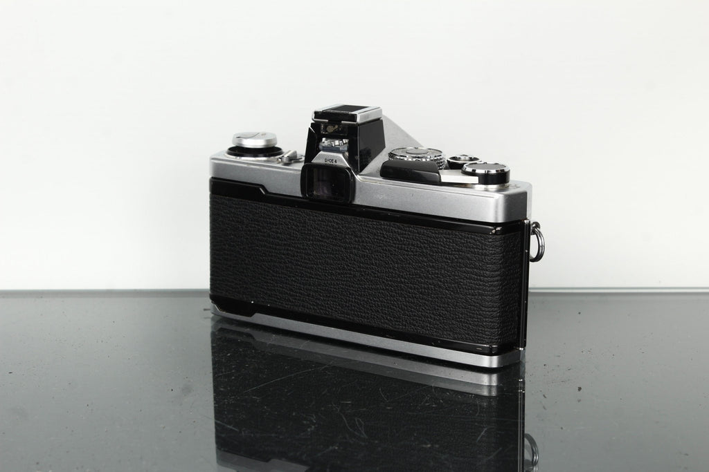 Olympus OM - 1N + Olympus OM 1:1.8 F=50mm - Dutch|Thrift