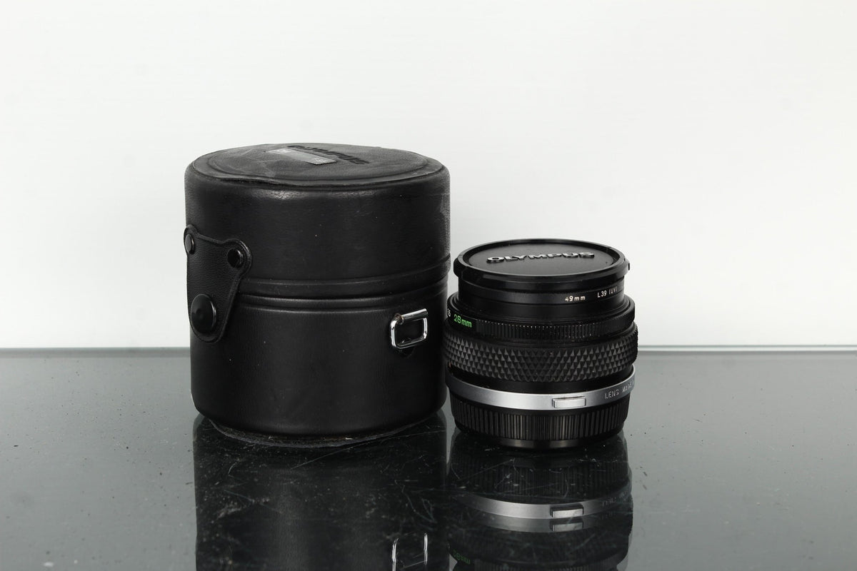 Olympus OM 28mm f/3.5 - Dutch|Thrift