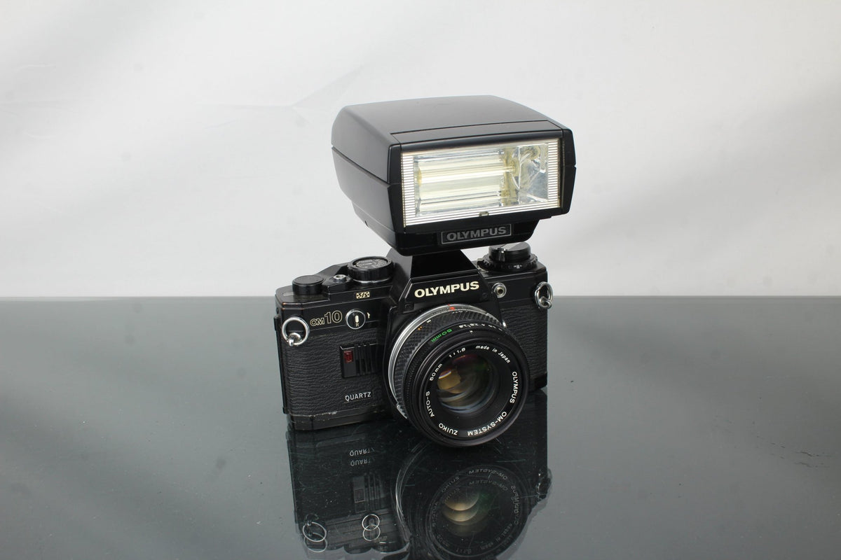 Olympus OM10 + OM Auto - S 50mm 1.8 Olympus lens - Dutch|Thrift