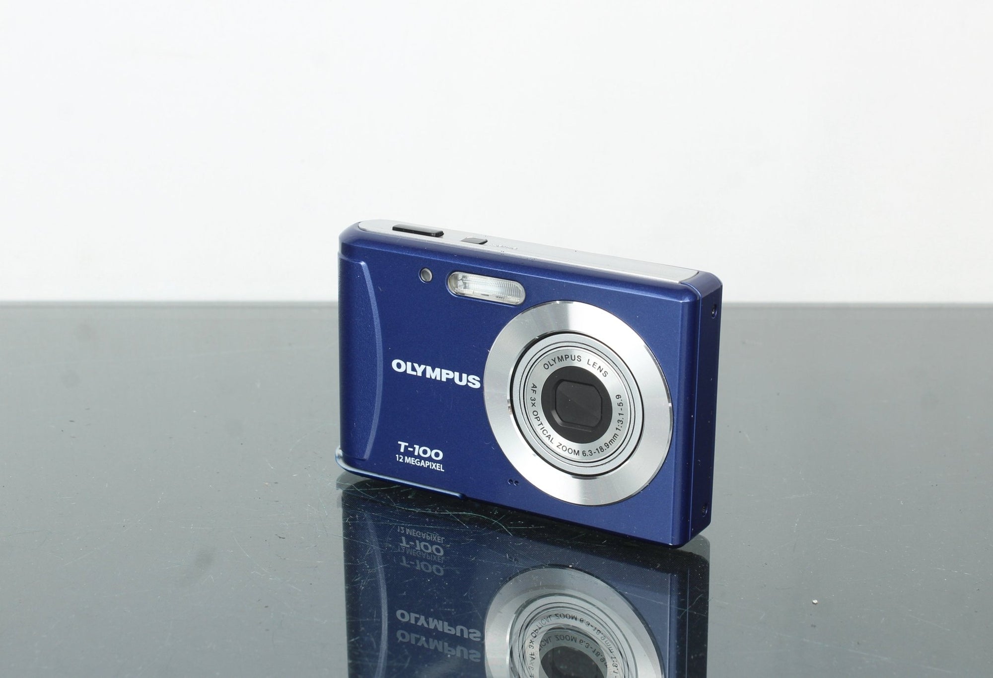 Olympus T - 100 - Dutch|Thrift