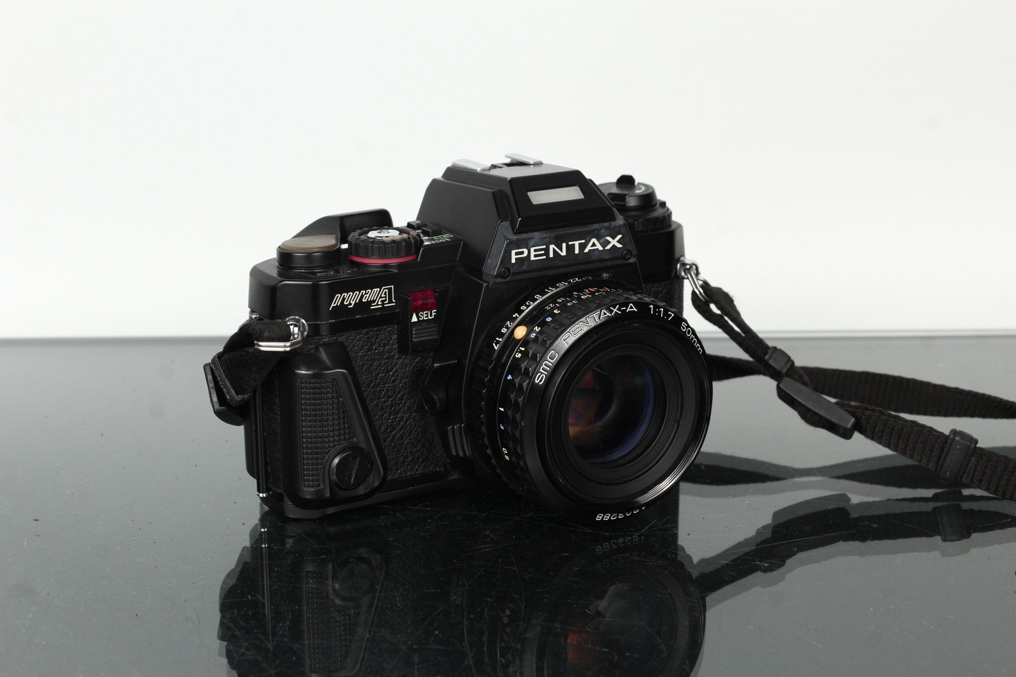 Pentax Program A 35mm SLR Film Camera with 50mm f/1.7 Lens – Dutch