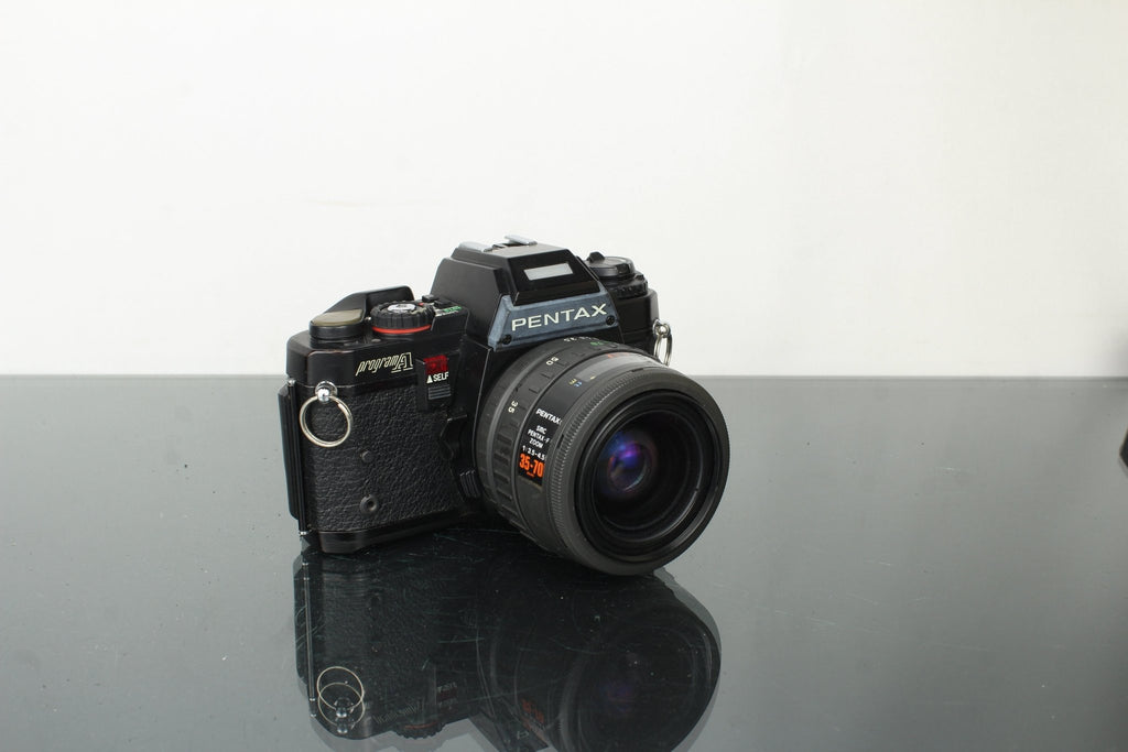 Pentax Program A + SMC Pentax - F Zoom 35 - 70mm f/3.5 - 4.5 - Dutch|Thrift