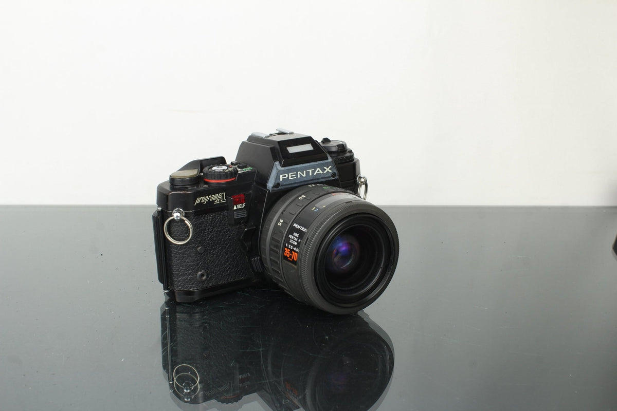 Pentax Program A + SMC Pentax - F Zoom 35 - 70mm f/3.5 - 4.5 - Dutch|Thrift