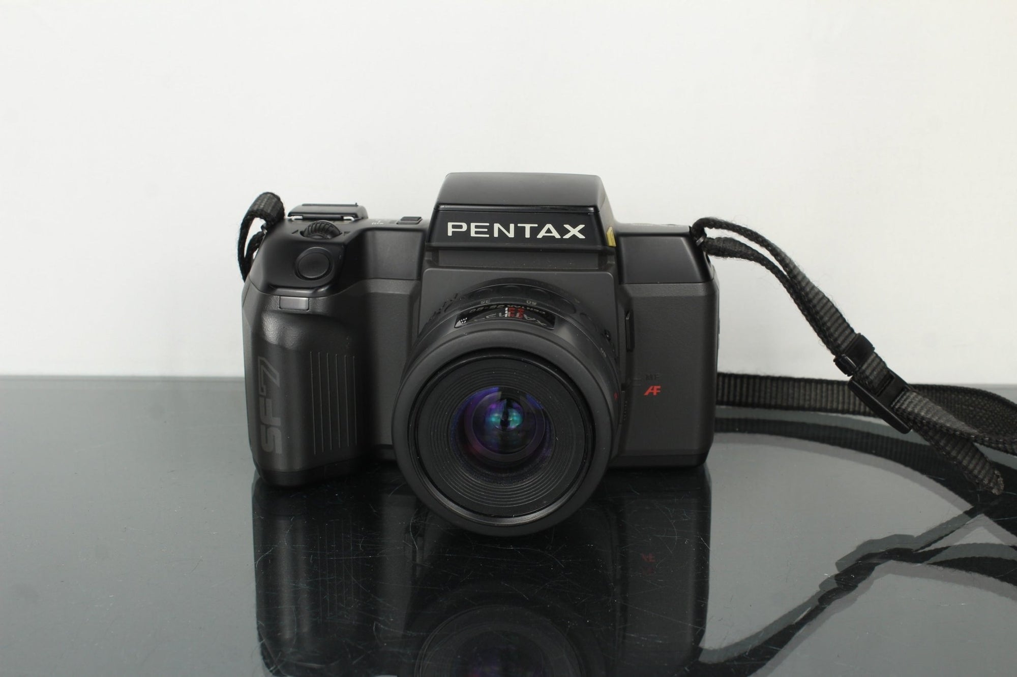 Pentax SF7 + SMC Pentax 1:4 - 5.6 35 - 80mm - Dutch|Thrift