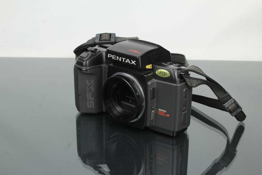 Pentax SFXn + M42 Converter mount - Dutch|Thrift