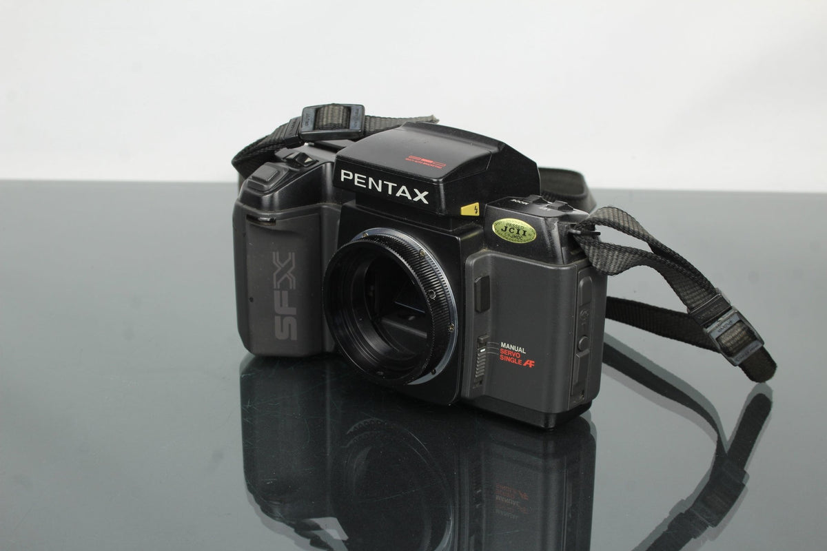 Pentax SFXn + M42 Converter mount - Dutch|Thrift