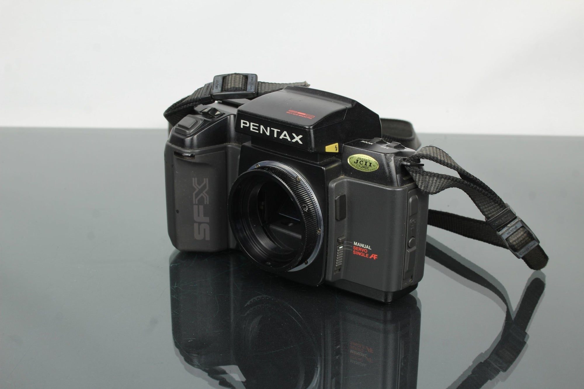 Pentax SFXn + M42 Converter mount - Dutch|Thrift