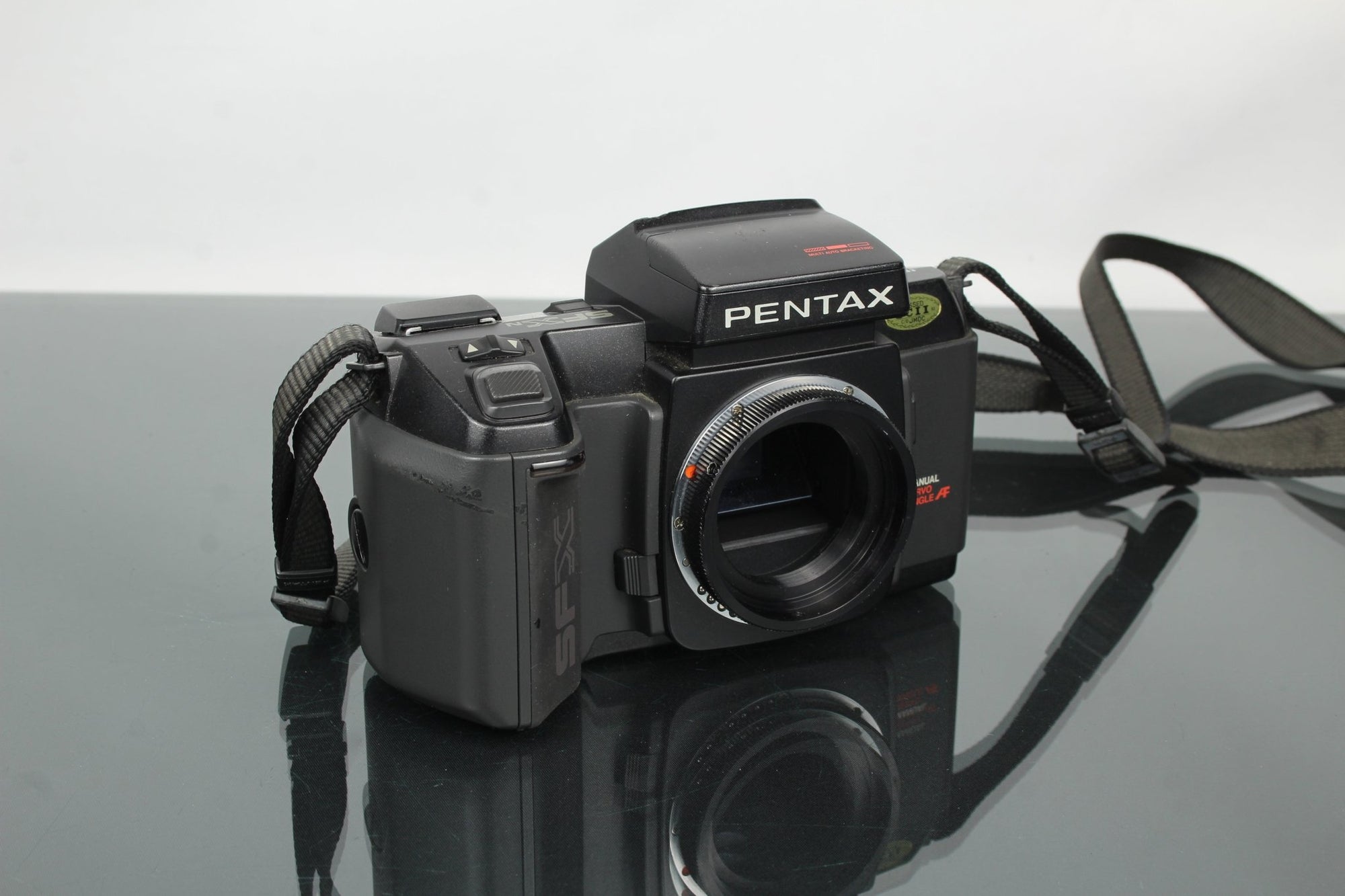 Pentax SFXn + M42 Converter mount - Dutch|Thrift