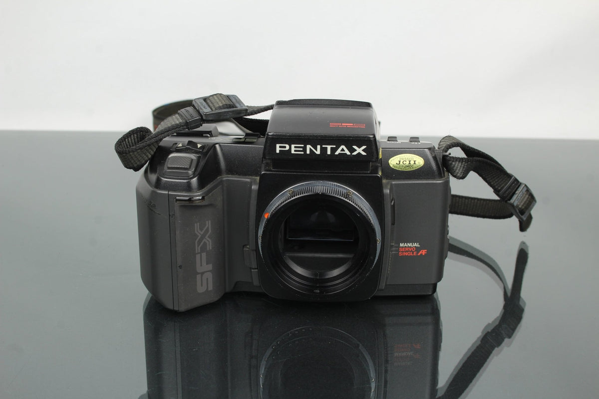 Pentax SFXn + M42 Converter mount - Dutch|Thrift