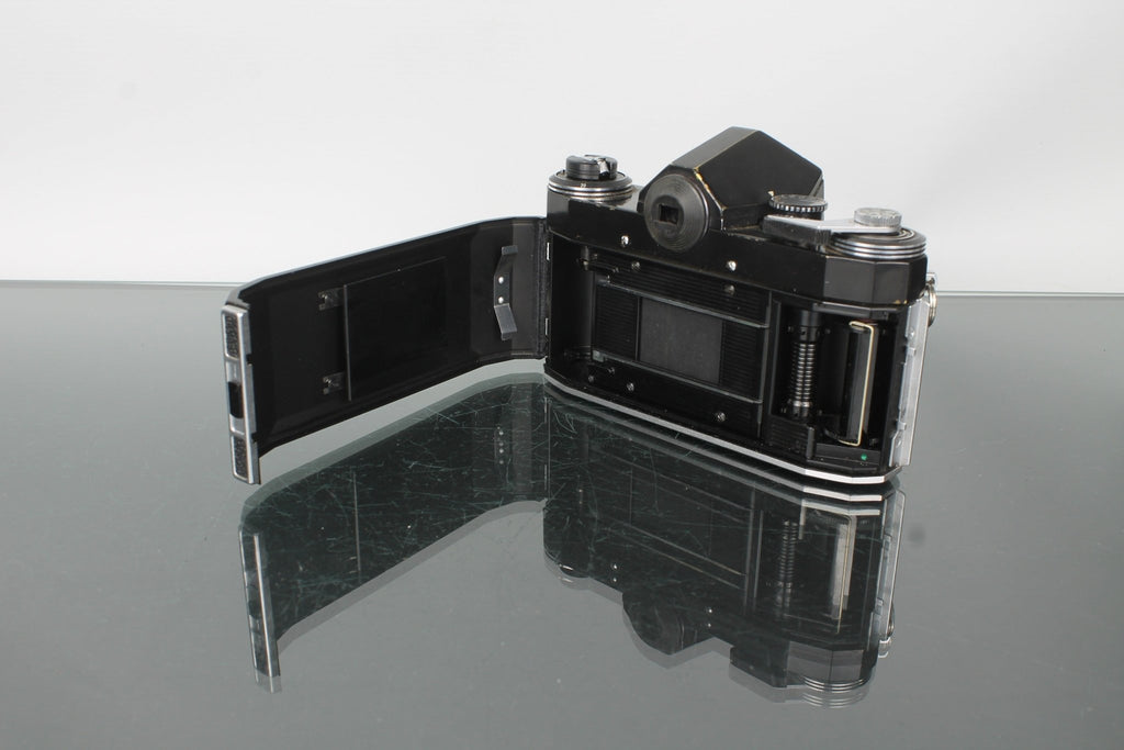 Praktica Super TL + Auto Revuenon 1:1.9 f=50mm 49 - Dutch|Thrift