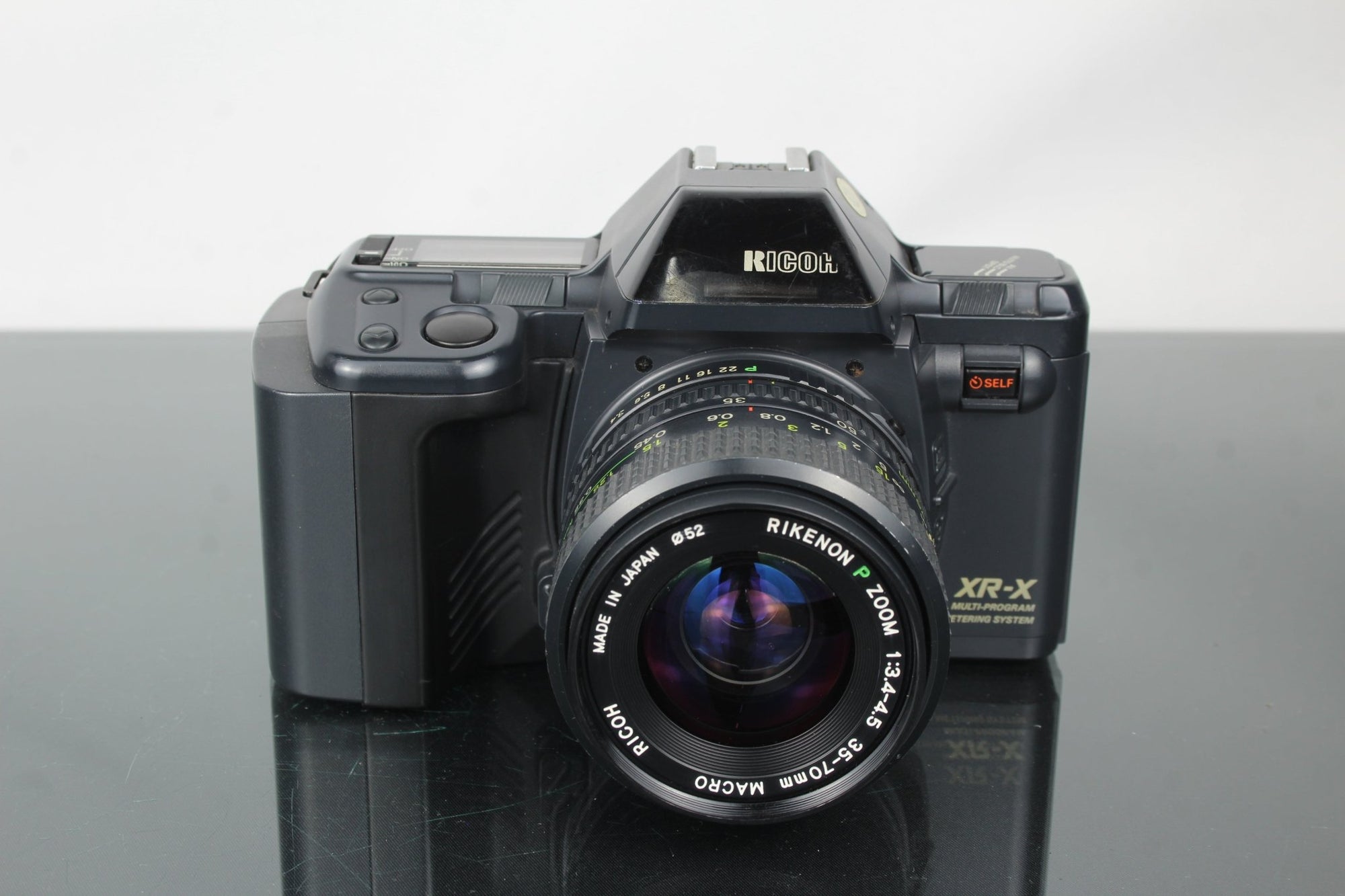 Ricoh XR - X + Rikenon P Zoom 35 - 70mm 3.4 - 4.5 lens - Dutch|Thrift