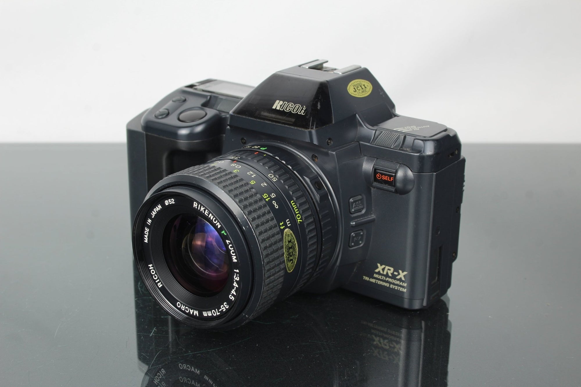 Ricoh XR - X + Rikenon P Zoom 35 - 70mm 3.4 - 4.5 lens - Dutch|Thrift