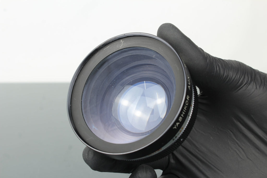 Yashikor aux. telephoto 1:4 s105 + Yashikor aux. wide angle 1:4 + Tele - wide finder - Dutch|Thrift